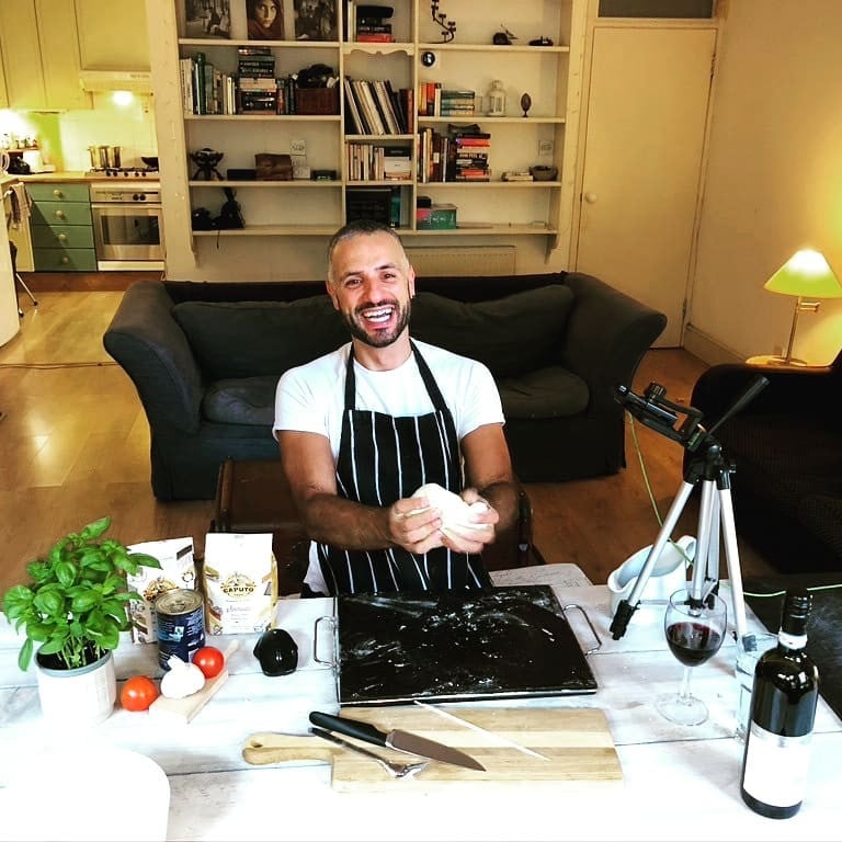 Chef Luca Favorito films an instructional cooking video from his home